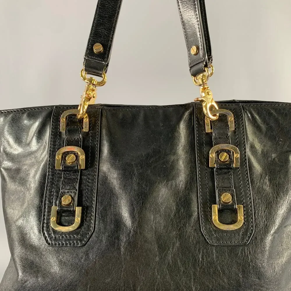 TORY BURCH Black Gold Bags